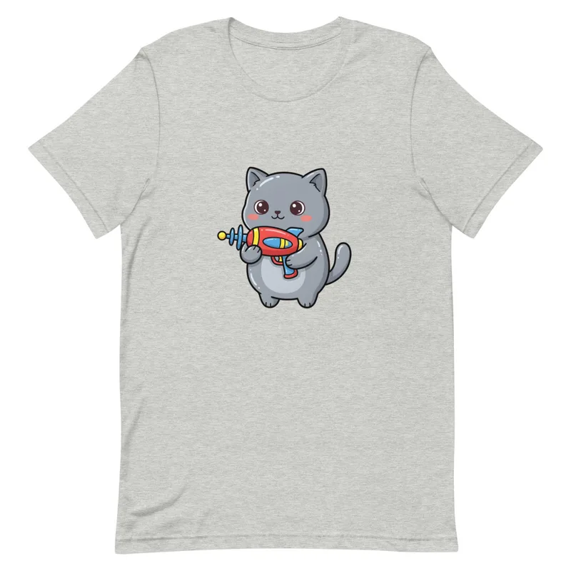 Galactic Kitty Adventure Tee, front view — chubby gray kitten with big sparkling eyes holding a colorful retro ray gun