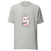 Sword-Wielding Bunny Tee, front view — chubby kawaii pink bunny holding a sword, big sparkly eyes, pastel colors, white