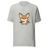 Ninja Fennec Adventure Tee, front view — cartoon fox holding a dagger and shuriken with a fierce expression on white