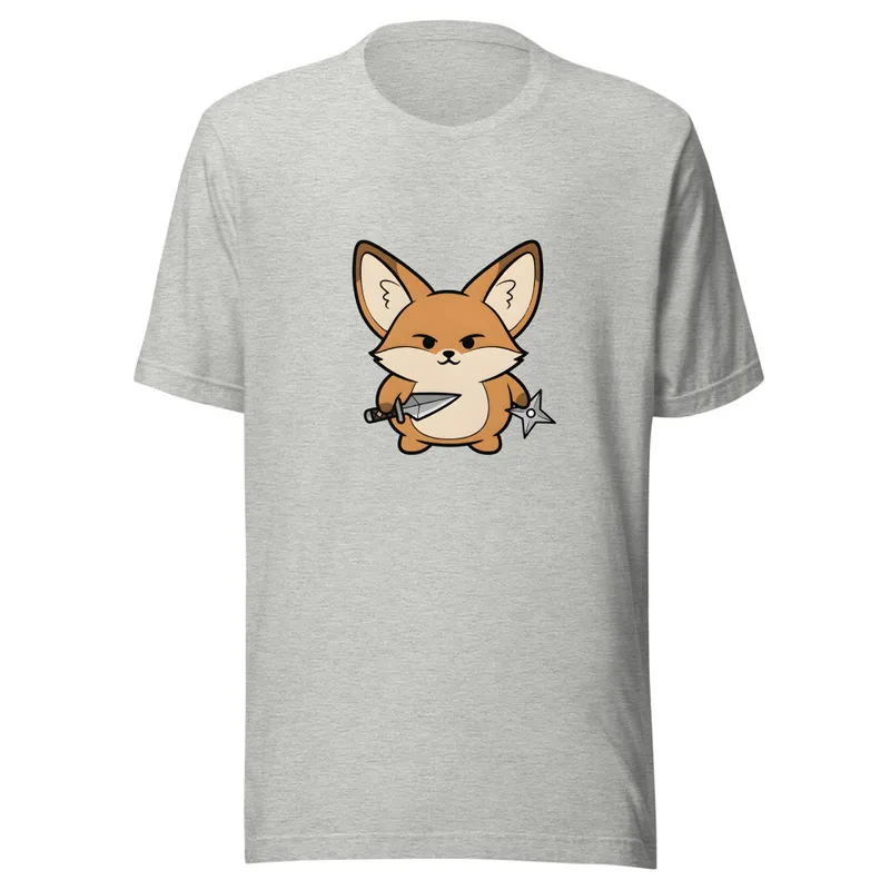 Ninja Fennec Adventure Tee, front view — cartoon fox holding a dagger and shuriken with a fierce expression on white