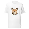 Ninja Fennec Adventure Tee, front view — cartoon fox holding a dagger and shuriken with a fierce expression on white