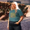 Stargazer Not Inevitable Peace Retro Tee, front view — bold 70s psychedelic lettering reading Not Inevitable with a peace