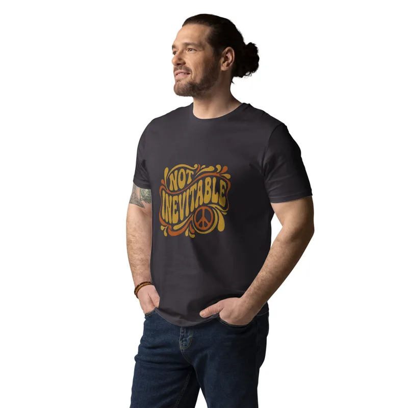 Anthracite Not Inevitable Peace Retro Tee, front view — bold 70s psychedelic lettering reading Not Inevitable with a peace