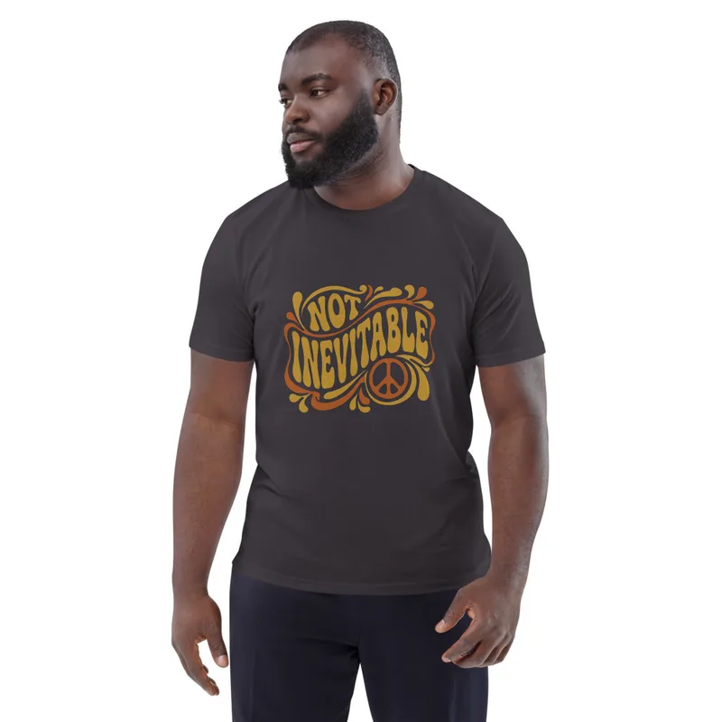 Anthracite Not Inevitable Peace Retro Tee, front view — bold 70s psychedelic lettering reading Not Inevitable with a peace