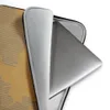 Torn Cardboard World Laptop Sleeve — world map illustration mimicking peeling kraft paper revealing corrugated cardboard