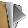 Desert Gold Weathered Patina Laptop Sleeve — warm amber and ochre surface with scattered silver-grey distressed flaking