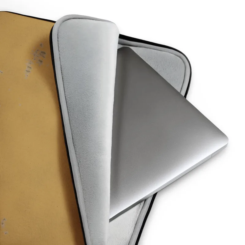 Desert Gold Worn Finish Laptop Sleeve — warm golden-ochre surface with subtle brushstroke texture and scattered worn patches