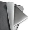 Charcoal Knit Texture Laptop Sleeve — close-up of a dark charcoal knit fabric pattern with interlocking stitches