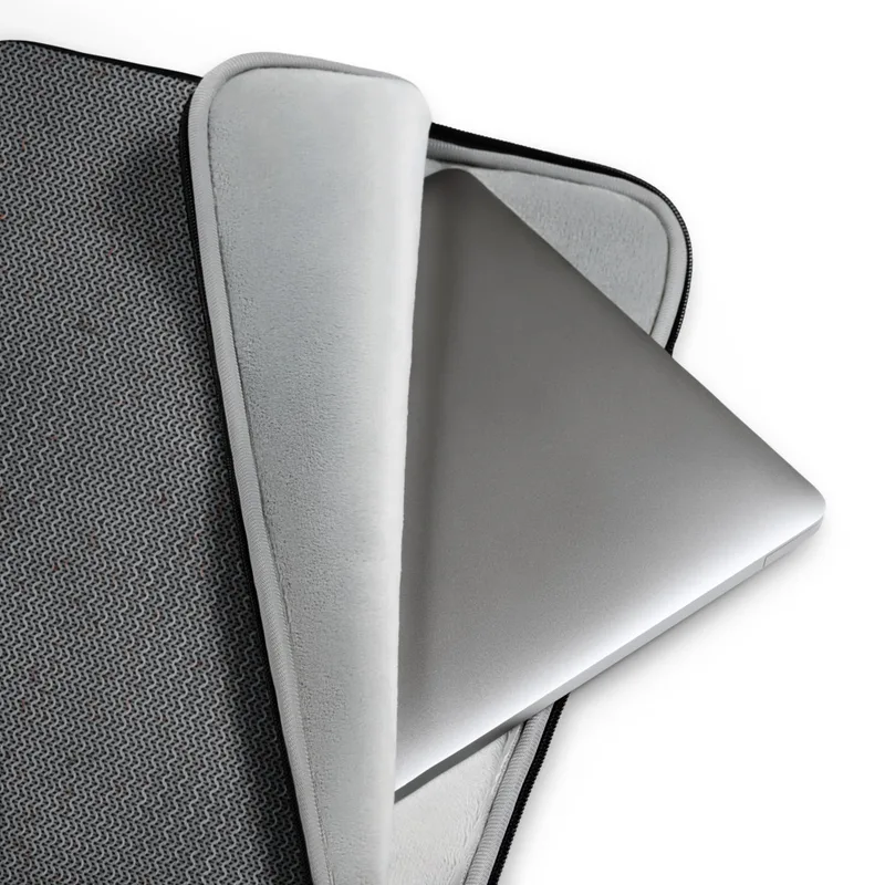 Charcoal Knit Texture Laptop Sleeve — close-up of a dark charcoal knit fabric pattern with interlocking stitches