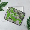 Circuit City Grid Laptop Sleeve — aerial view of a futuristic city rendered as dense circuit board grids in lime green