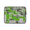 Circuit City Grid Laptop Sleeve — aerial view of a futuristic city rendered as dense circuit board grids in lime green