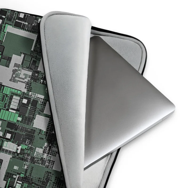 Forest Green Circuit City Chaos Laptop Sleeve — aerial view of a densely packed geometric megacity in forest green, charcoal