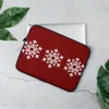 Winter Snowflake Trio Laptop Sleeve — three identical intricate white geometric snowflakes arranged in a row on a deep