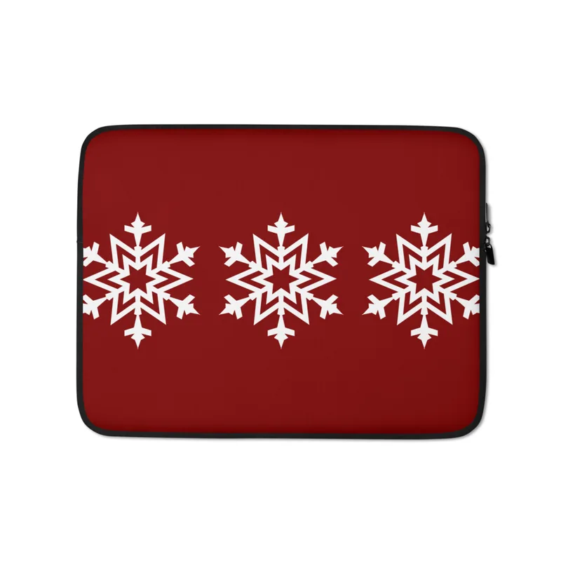 Winter Snowflake Trio Laptop Sleeve — three identical intricate white geometric snowflakes arranged in a row on a deep