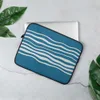 Ocean Wave Lines Laptop Sleeve — flowing white wavy horizontal lines on a textured teal blue background, evoking calm ocean