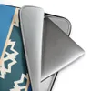 Arctic Fracture Laptop Sleeve — jagged cracked ice shards in cream white on deep teal horizontal band, framed by sand