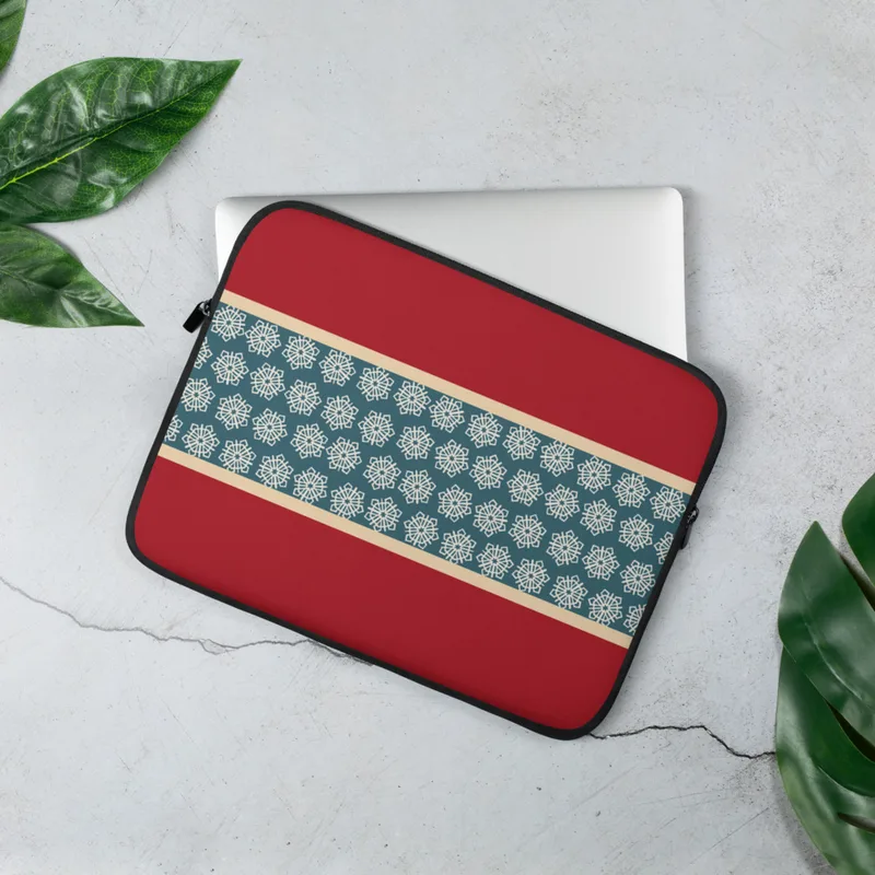 Crimson Band Snowflake Laptop Sleeve — deep red background with a horizontal teal band bordered in cream, filled