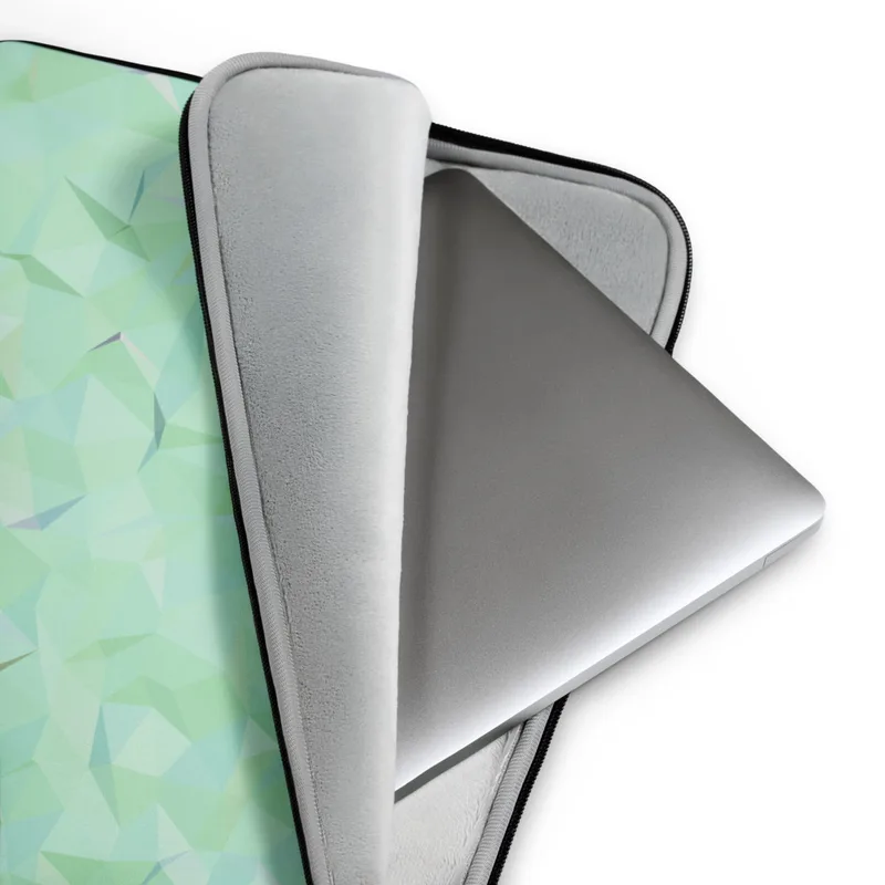 Mint Crystal Geometry Laptop Sleeve — low-poly crystal pattern of soft mint, aqua, and pearl triangles forming a faceted
