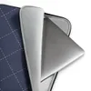 Navy Diamond Quilted Laptop Sleeve — navy blue textured fabric with white dashed diagonal diamond grid and small cross