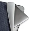 Midnight Carbon Fiber Laptop Sleeve — navy blue carbon fiber twill weave pattern with diagonal light-reflecting bands