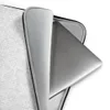 Classic White Knit Laptop Sleeve — seamless tone-on-tone white knit fabric texture with subtle interlocking stitch pattern