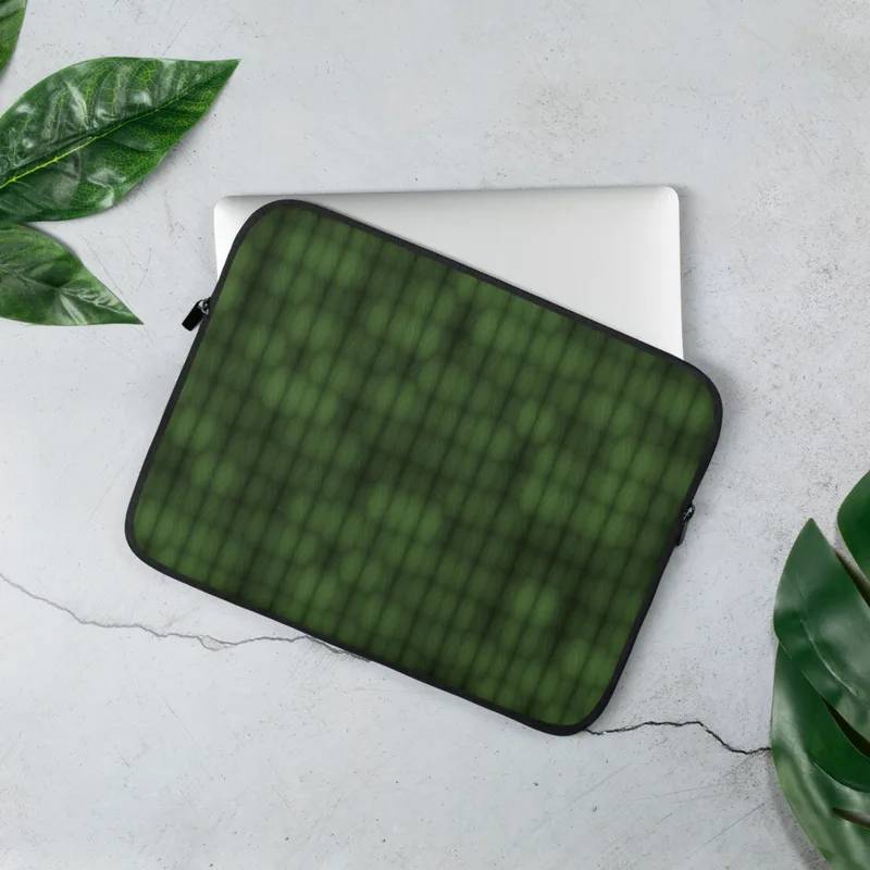 Forest Grid Texture Laptop Sleeve — repeating grid of rounded organic cells in layered deep forest green tones with subtle