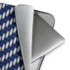 Steel and Sapphire Woven Shield Laptop Sleeve — interlocking navy blue and brushed silver bands in a precise basket-weave