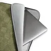 Sage Woven Basket Weave Laptop Sleeve — alternating woven square blocks with horizontal and vertical line textures in muted