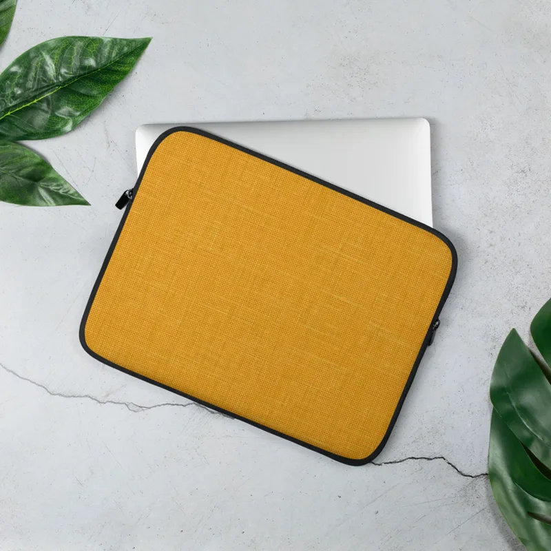 Golden Linen Texture Laptop Sleeve — close-up woven linen fabric texture in warm amber and marigold tones with subtle thread