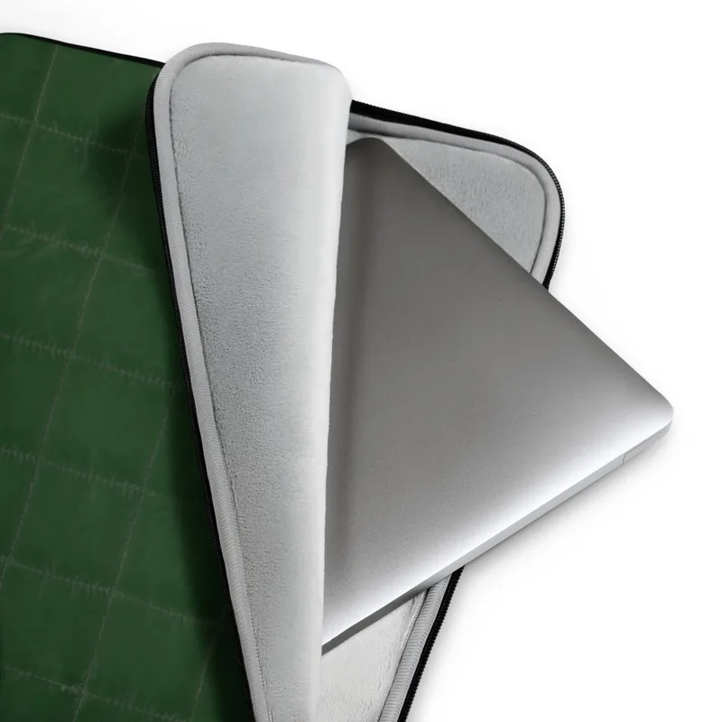 Forest Green Quilted Classic Laptop Sleeve — deep forest green quilted fabric with a uniform grid of precise stitching lines