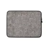 Urban Felt Grey Laptop Sleeve — close-up photograph of grey industrial felt with tangled fibers and scattered colorful