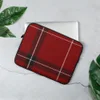 Crimson Highland Plaid Laptop Sleeve — classic red tartan fabric pattern with bold black bands and thin white pinstripes