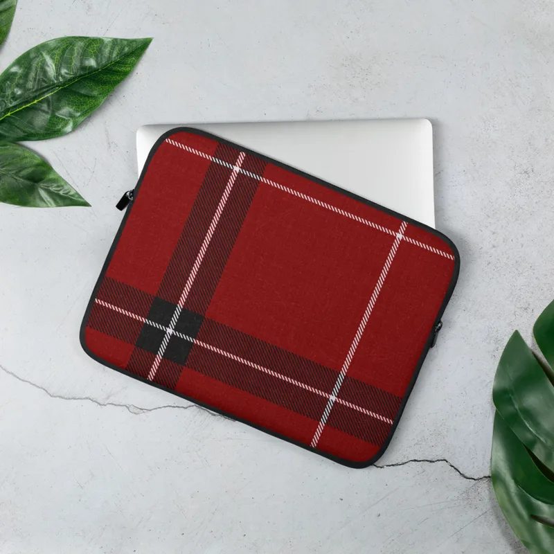 Crimson Highland Plaid Laptop Sleeve — classic red tartan fabric pattern with bold black bands and thin white pinstripes