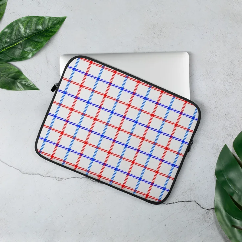American Plaid Laptop Sleeve — red and blue intersecting plaid stripes on a white background forming a classic American