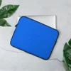 Azure Blue Minimalist Laptop Sleeve — solid vivid azure blue surface with subtle light crackle texture throughout