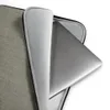 Slate Weave Minimal Laptop Sleeve — close-up woven textile pattern in muted slate grey and warm beige with a fine crosshatch