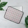 Classic Red Windowpane Laptop Sleeve — evenly spaced red windowpane grid lines on a white woven-texture background