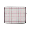 Classic Red Windowpane Laptop Sleeve — evenly spaced red windowpane grid lines on a white woven-texture background