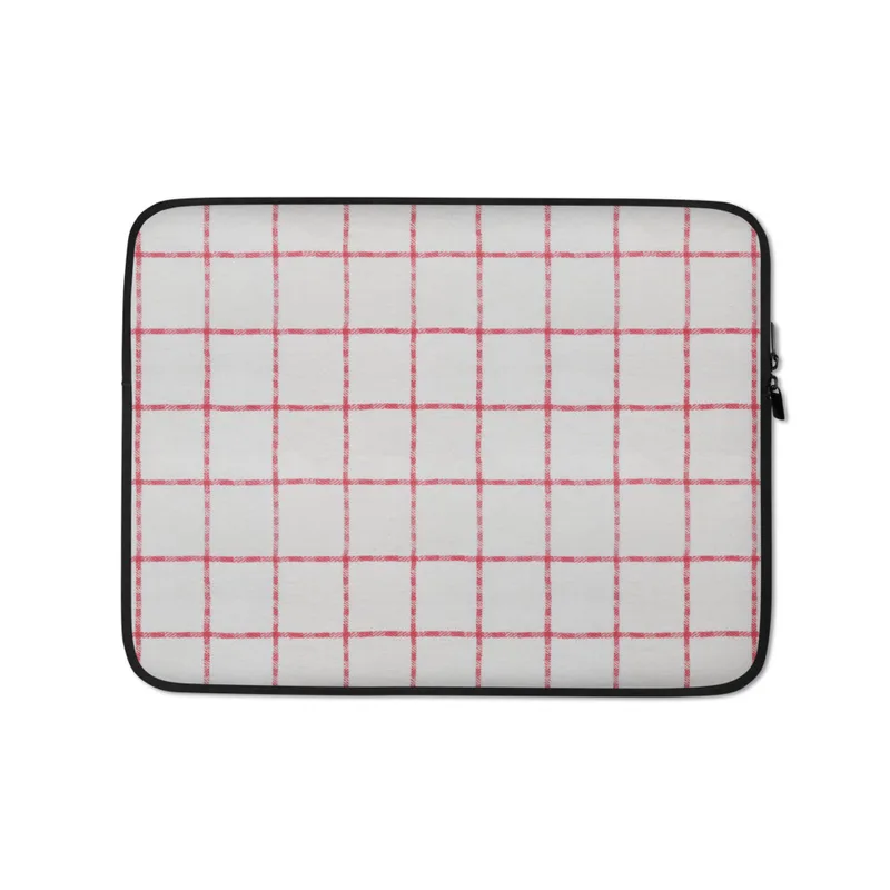 Classic Red Windowpane Laptop Sleeve — evenly spaced red windowpane grid lines on a white woven-texture background
