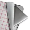 Classic Red Windowpane Laptop Sleeve — evenly spaced red windowpane grid lines on a white woven-texture background