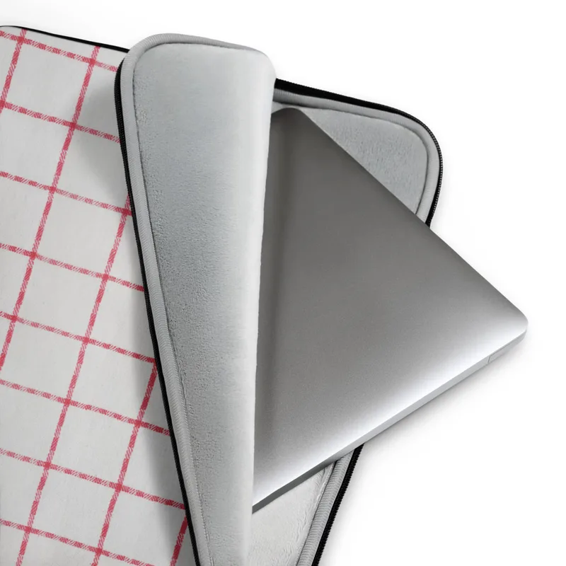 Classic Red Windowpane Laptop Sleeve — evenly spaced red windowpane grid lines on a white woven-texture background