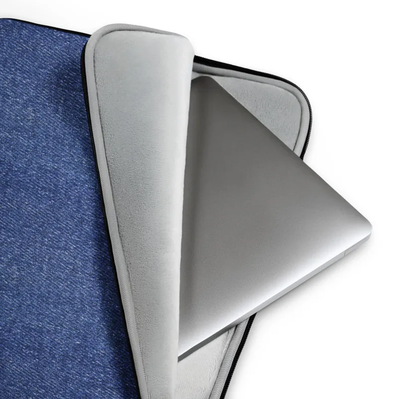 Classic Denim Texture Laptop Sleeve — close-up medium-wash blue denim fabric texture with visible diagonal twill weave
