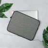 Coastal Weave Texture Laptop Sleeve — tightly woven checkerboard textile pattern in slate teal and warm beige with fine