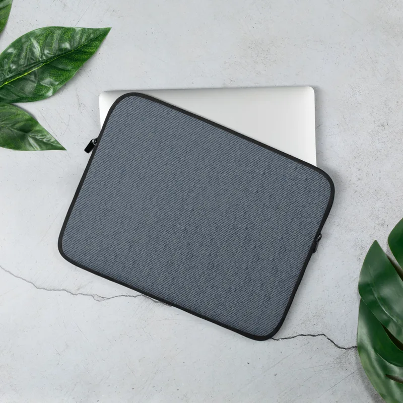 Classic Denim Twill Laptop Sleeve — close-up of a soft blue-grey diagonal twill weave texture resembling worn denim fabric