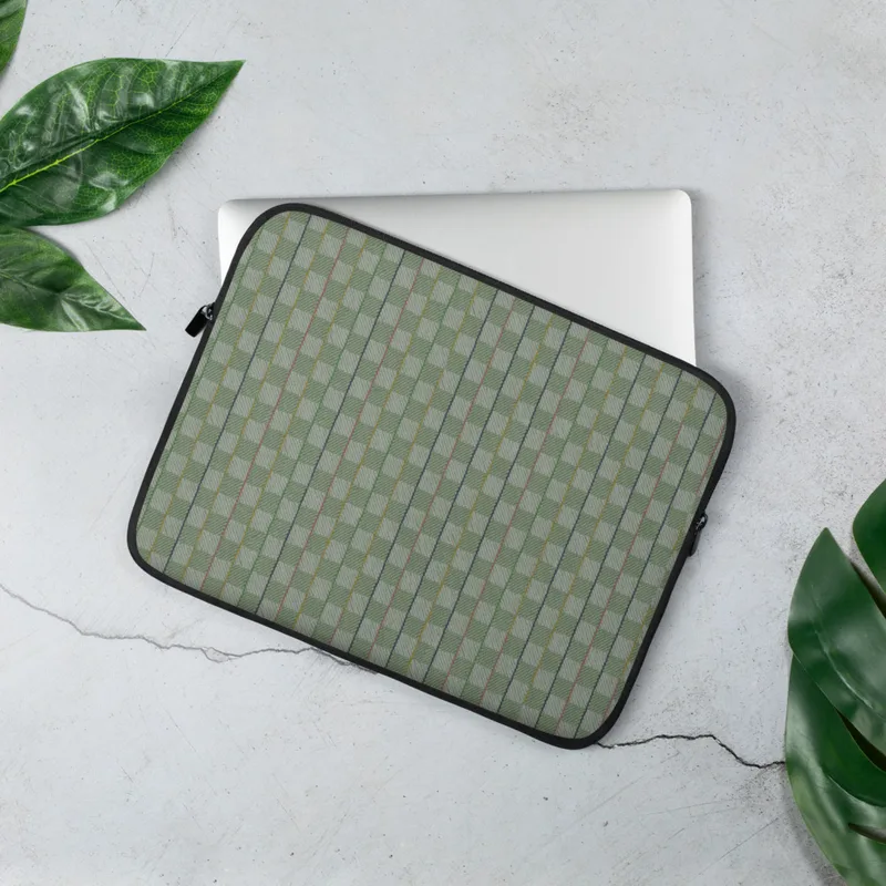Garden Lattice Woven Laptop Sleeve — basket-weave grid pattern in sage and mint green with fine vertical stripes of navy