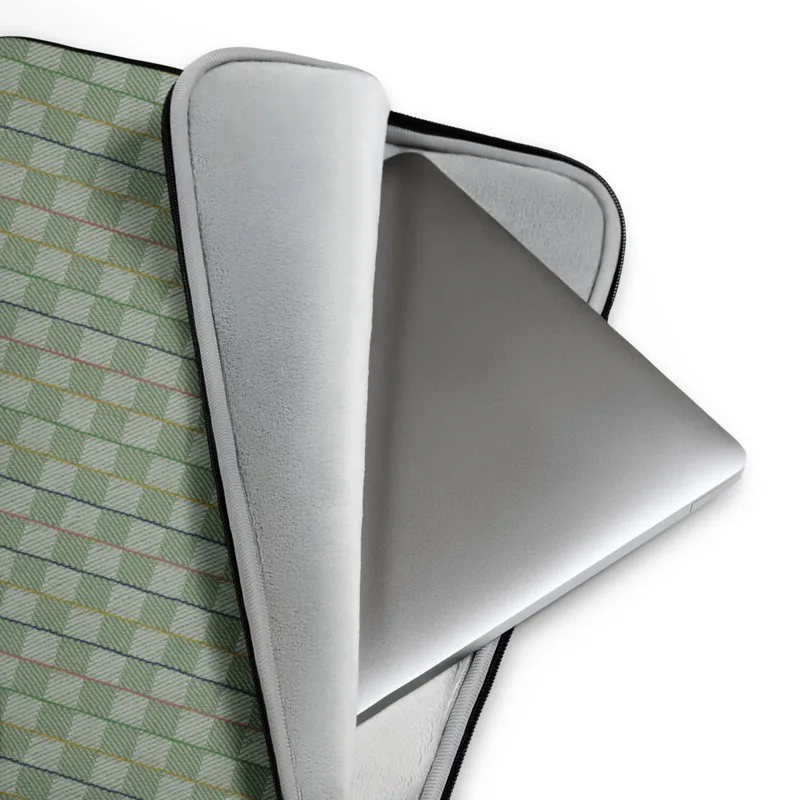 Garden Lattice Woven Laptop Sleeve — basket-weave grid pattern in sage and mint green with fine vertical stripes of navy