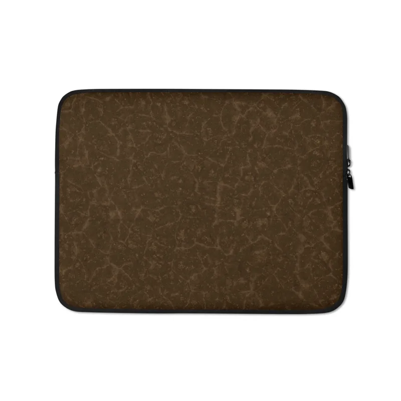Cracked Earth Brown Terrain Laptop Sleeve — dark brown cracked earth surface with fine lighter brown fissure lines forming