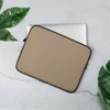 Warm Sand Minimal Laptop Sleeve — smooth warm sandy beige surface with a faint scattered speckle texture in a soft matte