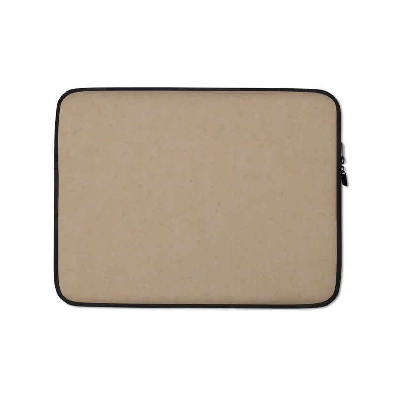 Warm Sand Minimal Laptop Sleeve — smooth warm sandy beige surface with a faint scattered speckle texture in a soft matte
