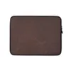 Copper Vintage Distressed Leather Laptop Sleeve — close-up of aged dark brown leather with natural creasing and copper-toned